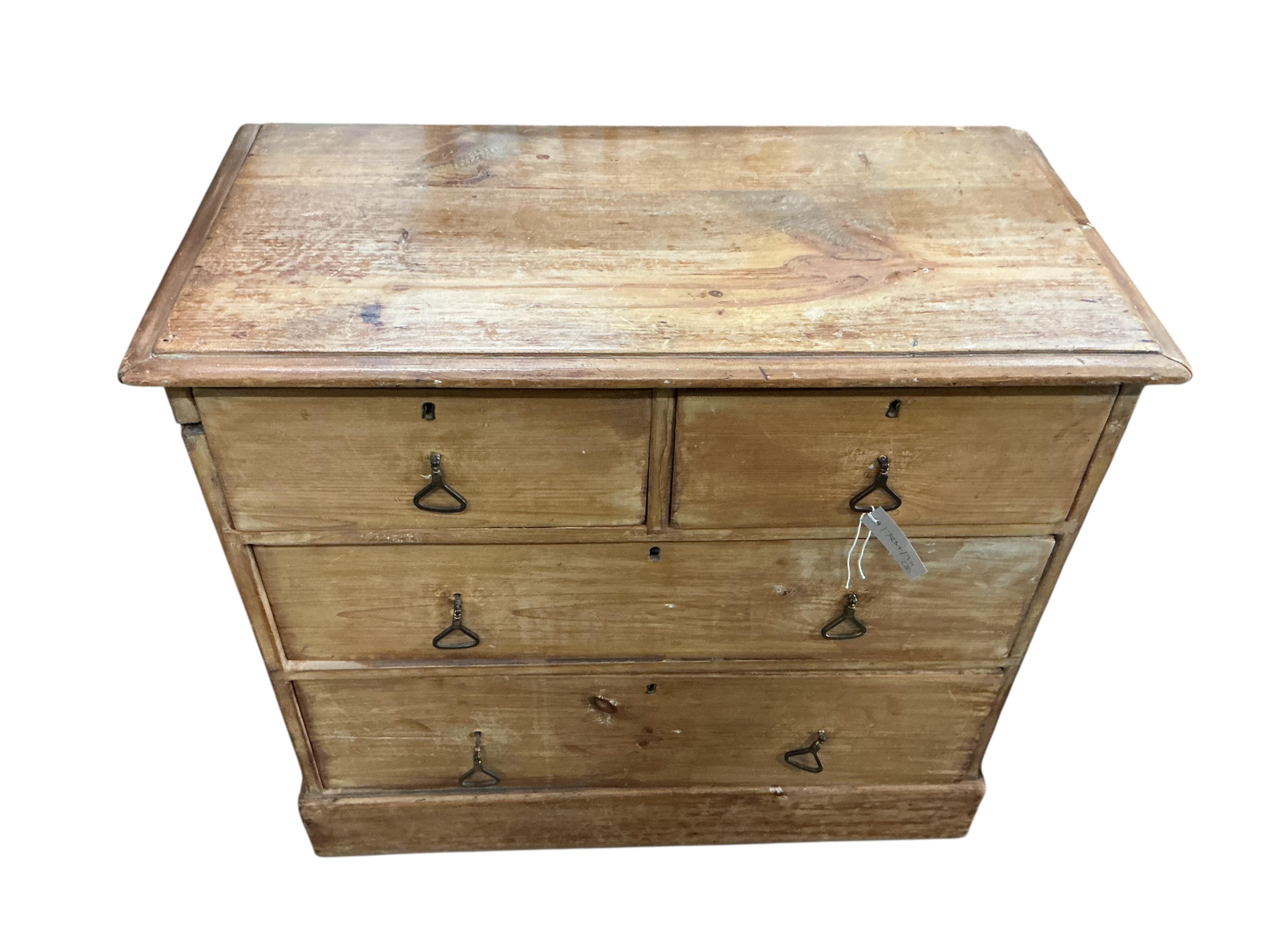 A Victorian pine inverse breakfront sideboard, width 136cm, depth 48cm, height 79cm, together with two Victorian pine chests of drawers